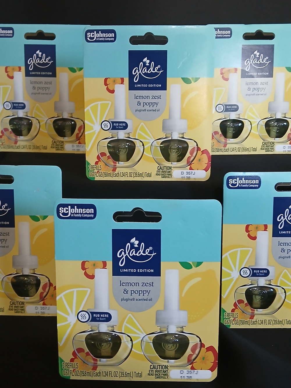 Glade Lemon Zest & Poppy PlugIns Refill Packs.